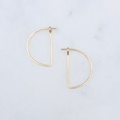 14k Recycled Gold - Semi Circle Hoops Your earrings will be made just for you and arrive in a gift box. There may be slight variations as is the beauty of handmade. Please allow 2-6 days for production. My shipping and packaging materials are recycled and recyclable. Orders are shipped via USPS 1st class and come with tracking. Once shipped most domestic orders arrive in 3-5 days. Holiday delivery times may vary. Priority shipping is available and comes with tracking and $100 insurance. All my w Unique Hoop Earrings, Minimalist Earrings Gold, Contemporary Earrings, Jewelry Words, Open Hoop Earrings, Solid Gold Earrings, Art Deco Earrings, Gold Geometric, Yellow Gold Earring