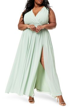 A flowy skirt and pleated bodice add graceful charm to this sleeveless maxi dress with an alluring V-neck. 60'' length (size 2X) V-neck Sleeveless Back zip closure 100% polyester shell/lining Machine wash Imported Model stats: 5'10" height, 41" bust, 36" waist, 48" hip. Model is wearing size 2X. Chiffon A-line Maxi Dress With Pleated Bodice, Flowy A-line Maxi Dress For Prom, Flowy Empire Waist Maxi Dress For Bridesmaids, Sleeveless Maxi Dress With Pleated Back For Bridesmaids, Sleeveless Maxi Dress With Pleated Back For Prom, Sleeveless Pleated Maxi Dress For Bridesmaid, Sleeveless Pleated Flowy Maxi Dress, Flowy V-neck Maxi Dress With Pleated Bodice, Bridesmaid Pleated Floor-length Maxi Dress