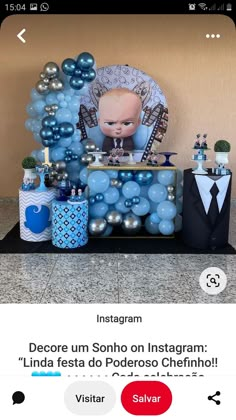 a table with balloons and pictures on it