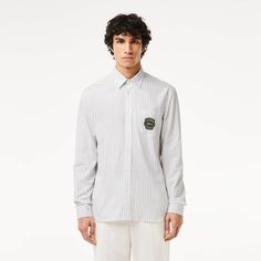 This impeccable shirt is made from crisp, striped cotton poplin. Featuring premium finish details, including René Lacoste embroidery inside the collar. A lightweight, elegant piece for any occasion. René Lacoste, Lacoste Sport, Men's Button Down Shirt, Lacoste Men, 2024 Collection, White Beige, Button Shirt, Men's Collection, Cotton Poplin