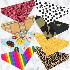 several different types of fabric and patterns on a white surface with black dots, oranges, yellows, and pinks