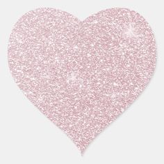 a heart shaped pink glitter sticker