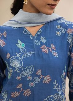 The ocean blue floral kurta set is adorned with delicate floral print, highlighted with contrasting thread embroidery. The pants feature linear thread embroidery and the powder blue dupatta comes with our signature tassel details to elevate your everyday ensemble. Blue Dupatta, Kurta Set For Women, Personal Shopping Service, Straight Fit Pants, Back Day, Thread Embroidery, Fashion App, Thread Work, Churidar