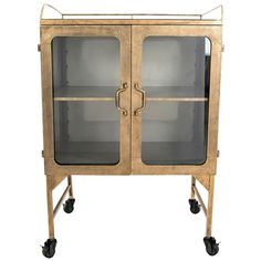 an old wooden cabinet with glass doors on casteors and wheels is shown against a white background