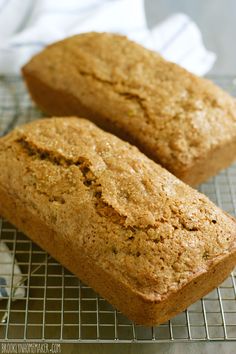 two loafs of banana bread on a cooling rack