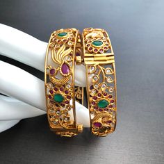 CZ Ruby Emerald Openable Bangles / Golden Cubic Zirconia Bracelet / Designer Ethnic Bangles / Indian Bollywood Traditional Bangles - Pair of 2 bangles - Made in brass alloy metal with CZ Stones, Ruby and Emerald alike stones - Comes in size 2.4,2.6 only - Suitable for any occasion - Width- Approx. .65 Inches Traditional Jeweled Bangle For Festive Occasions, Traditional Bangle Bracelets With Jewels, Traditional Jeweled Bangle Jewelry, Traditional Gold Bangle With Jewels, Traditional Gold Jeweled Bangle, Traditional Jeweled Bangle, Traditional Gold Bracelets With Jewels, Traditional Gold Bracelet With Jewels, Traditional Bangles