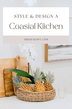 pineapples in a basket sitting on top of a table with the words style & design a coastal kitchen