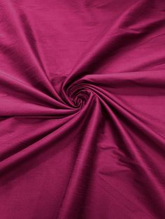 a close up view of a pink fabric