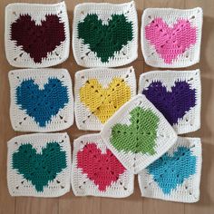 six crocheted squares with hearts on them