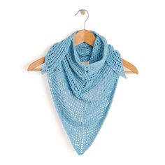 a blue shawl hanging on a wooden hanger