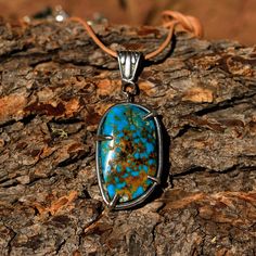 One of a kind! Custom shaped Sterling Silver pendant hand crafted high in the mountains of Northern New Mexico by local silversmith and lapidary artist Michael Silberhorn. Custom shaped Kingman, Az. Turquoise Cabochon in a custom made Sterling Silver setting. I hand form, hand texture and silversmith all the materials for a truly unique piece of art! This item is one of a kind - you will receive the exact item pictured. This Turquoise is from the Kingman Turquoise Mine, Kingman, Az. Approx. 40 m Outdoor Handmade Pendant Jewelry, Artisan Turquoise Cabochon Oval Pendant Necklace, Artisan Turquoise Necklace With Oval Cabochon Pendant, Artisan Chrysocolla Jewelry For Collectors, Nature-inspired Chrysocolla Pendant Jewelry, Handmade Artisan Jewelry For Outdoor, Outdoor Artisan Handmade Jewelry, Artisan Turquoise Necklace With Large Stone For Gift, Spiritual Turquoise Cabochon Necklace