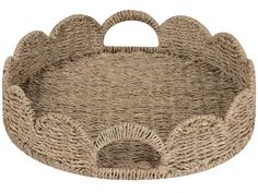 a round basket with handles made out of straw