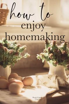 two vases filled with flowers and eggs sitting on top of a table next to each other