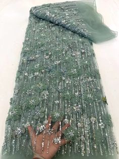 This high quality Fabric is measured in 5 Yards With Embroidered Beading and Sequin. It is soft, very delicate and beautiful. This high Quality Fabric is made with Fashion embroidered rhinestones can be used in making party wedding dresses, skirts, shawls, scarves and other other fashion apparels as you would like. Size : Length : 5 yards (180 inch). Width: 50 inch (Please allow slight deviation for the measurement data ,±1 inch) Material: 100% Polyester, Tulle Lace Fabric, Eco-Friendly embroide Color Durazno, Green Tulle, Beaded Lace Fabric, Nigerian Lace, Embroidered Lace Fabric, Net Fabric, African Lace, Sequins Embroidery, Sequin Beading