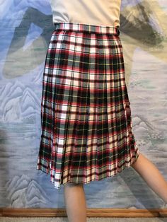 "Vintage Checkered Skirt 80s Women White Red Skirt Tartan Skirt Wool Blend Kilt Pleated Skirt Size Medium to Large High Waist Skirt Label size: EUR 40 Estimated size: M/L Material: 67% Polyester; 33%Songerfasern Measurements: Length: 25,5\" / 65 cm Waist: 14\"+2\" / 35 cm +5cm adjustable *Measurements taken while garment lay flat, to get girth you need to double Please check measurements to insure a proper fit. Remember to allow yourself some extra room for movement. You can compare these with s Retro Red Skirt For Fall, Red Retro Pleated Skirt, Plaid Skirt For School, Fitted Knee-length School Skirt, School Fitted Knee-length Skirt, Retro Red Pleated Bottoms, Retro Pleated Mini Skort, Retro School Skort With Lined Skirt, Red Pleated Skirt For School In Spring