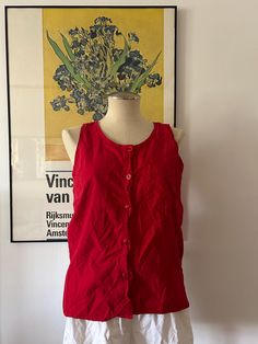 Vintage red vest. 100% cotton. Has buttons all down the front. No damage. Size Small. NO RETURNS. Red Vest With Pockets For Spring, Casual Red Cotton Tank Top, Red Vintage Vest For Summer, Cotton Button-up Vest, Vintage Red Vest For Summer, Red Cotton Casual Vest, Casual Red Cotton Vest, Casual Red Vest With Pockets, Cotton Vest With Button Closure