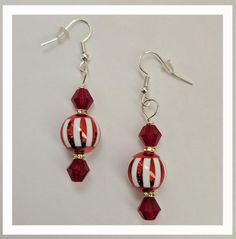 Handmade dangle earrings featuring adorable holiday beads...the perfect addition to your holiday jewelry collection! Handmade Dangle Earrings, Earrings Handmade Dangle, Handmade Holiday, Holiday Jewelry, Beaded Dangle Earrings, Beaded Dangles, Jewelry Earrings Dangle, Jewelry Collection