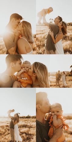 a man and woman kissing while holding their baby in the middle of an open field