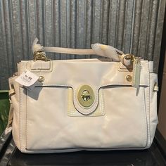 Beautiful All Season Bag! There Is A Minor Blemish On Leather Next To Closure Lock See Close Up Pic! Cream Shoulder Bag With Branded Hardware And Double Handle, Cream Shoulder Bag With Branded Hardware, Designer Cream Satchel, Chic Beige Coach Satchel, Formal Cream Satchel With Branded Hardware, Coach Cream Shoulder Bag With Branded Hardware, Chic Cream Satchel With Branded Hardware, Chic Coach Satchel With Branded Hardware, Cream Satchel With Branded Hardware