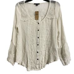 Add A Touch Of Bohemian Style To Your Wardrobe With This Beautiful American Eagle Outfitters Blouse. Featuring A Scoop Neckline, Button Closure, And Long Bell Sleeves, This Blouse Is Perfect For Any Occasion. The Pleated Accents And White Lace Pattern Add A Touch Of Elegance To The Blouse, Making It A Versatile Addition To Your Wardrobe. This Blouse Is Perfect For Women Who Love To Add A Touch Of Style To Their Outfits. The Size S Blouse Is Made In India And Is Perfect For Regular-Sized Women. W Beige Bohemian Tops With Buttons, Beige Bohemian Top With Buttons, Bohemian Spring Tops With Buttons, Bohemian Spring Blouse With Buttons, Spring Bohemian Blouse With Buttons, Casual Button-up Peasant Top For Fall, Bohemian Button-up Tops With Buttons, Casual Button-up Blouse With Lace Trim, Spring Bohemian Button-up Tops