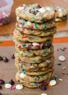 a stack of cookies with sprinkles and chocolate chips