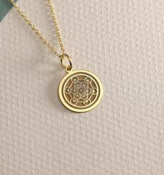 14K Real Solid Gold  Metatron necklace ● Material of pendant: Solid Gold 14k ( REAL GOLD ) ● Metal Stamp: 14L ( REAL GOLD ) ● The pendant is available in 6 sizes: - 14,0 mm / 0,55 inches ( Diameter ) In the photos - 15,3 mm / 0.60 inches ( Diameter ) - 16,5 mm / 0,65 inches ( Diameter ) - 19,1 mm / 0,75 inches ( Diameter ) - 21 mm / 0,82 inches ( Diameter ) - 23 mm / 0.90 inches ( Diameter ) ( In the photos the size is 14mm / 0.55 inches Diameter ) ( Jump Ring inner diameter: 4 mm ) ● Material O 14k Gold Amulet Pendant Necklace, 14k Gold Amulet Charm Necklace With Round Pendant, 14k Yellow Gold Amulet Charm Necklaces, 14k Gold Round Amulet Charm Necklace, Yellow Gold Medallion Necklace With Si Clarity, 14k Gold Amulet Necklace, 14k Gold Round Amulet Necklace, Metatron's Cube, Sacred Geometry Jewelry