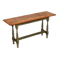 an old wooden table with two legs and a wood top on the bottom, against a white background