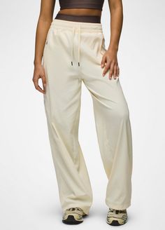 A day-off essential high-rise pant with a pull-on elastic waist and moisture-wicking, double knit fabric. Sporty Stretch Wide Leg Ankle-length Pants, Sporty Stretch Ankle-length Wide Leg Pants, Spring Athleisure Wide Leg Pants, Spring Athleisure Wide-leg Pants, Stretch Sweatpants With Elastic Waistband For Elevated Casual, Stretch Sweatpants With Elastic Waistband For Casual Wear, Sporty Spring Daywear Bottoms, Sporty 4-way Stretch Pants For Everyday, Spring Stretch Wide Leg Pants With Straight Hem