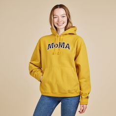 MoMA Exclusive: Champion originally made their hoodie to keep athletes warm during training in the 1930s. This Champion Garment-Dyed Hoodie - MoMA Edition is our current take that nods to '90s minimalism with �MoMA� appliqu�d in classic collegiate-style letters. Thanks to the special process of garment dyeing, each sweatshirt has a super soft feel and cool washed-out look. The MoMA Champion Hoodie was first produced in connection with MoMA's 2017 exhibition Items: Is Fashion Modern? An original version of the brand's hoodie from the 1980s is an object in the museum's collection. The Champion Garment-Dyed Hoodie - MoMA Edition is available in sizes Small through X-Large. 90s Minimalism, Casual 90s, Style Letters, Classic Sportswear, Collegiate Style, Closet Essentials, Champion Hoodie, Sportswear Brand, Museum Collection