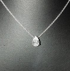 KGM Diamonds ltd 💎 manually polished with ❤️ Handmade item beautiful impressive natural, not enhanced, pear shaped (teardrop) polished diamond in a solitaire white gold pendant setting with a gold necklace diamond: natural shape: Pear brilliant weight:  0.5-0.60 carat color: H clarity: SI1 GIA certified gold: 14k white necklace: 42 cm or 16.8 inch free gift box free international shipping this diamond was polished in our polishing factory, handmade. As well as this pendant handndmade  in our je Luxury Solitaire Teardrop Jewelry, Timeless Pear-shaped Diamond White Jewelry, Pear-shaped Diamond Necklace, Silver Jewelry With Brilliant Cut Pear Shape, Silver Pear-shaped Jewelry With Brilliant Cut, Classic Pear-shaped Diamond Drop Necklace, Pear-shaped White Diamond Necklace, Fine Jewelry Pear-shaped Drop Necklace For Formal Events, Formal Pear-shaped Diamond Cut Drop Necklace