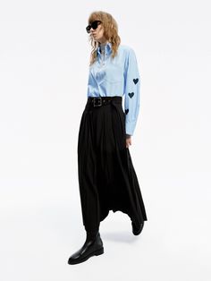 MO&Co. Women's Include Belt Maxi Skirt A transitional wardrobe staple, this maxi skirt is crafted from well-made fabric. The A-line silhouette is both elegant and flattering, while the side pockets and pleated details add functionality and flair. It's offered in classic black, the airy design is completed with a tonal belt for a touch of sophistication. Features : - High waist A-line maxi silhouette- Side slip pockets, pleated design- Belt loops and include the belted Code: MBD1SKT030The back le Fall Wide Leg Maxi Skirt For Work, Flowy Maxi Skirt For Fall Workwear, Fall Pleated Maxi Skirt For Workwear, Fall Workwear Pleated Maxi Skirt, Workwear Asymmetrical Maxi Skirt With Pleats, Fall Evening Wide Leg Maxi Skirt, Asymmetrical Pleated Maxi Skirt For Work, Asymmetrical Workwear Maxi Skirt With Pleats, Flared Maxi Skirt With Pockets For Work