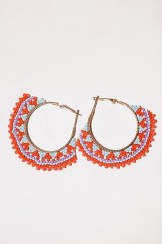 Elegant multi-colored flat seed bead hoop earrings with latchback hoop Nickel Free Summer Hoop Earrings, Nickel-free Circle Hoop Earrings For Summer, Summer Nickel Free Hoop Earrings, Summer Nickel-free Hoop Earrings, Summer Metal Jewelry, Beaded Metal Earrings, Colorful Beaded Circle Earrings As Gift, Multicolor Small Hoop Jewelry With Spacer Beads, Colorful Beaded Circle Earrings For Gift