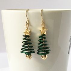 Item Type: Earrings Gender: Women Material: Zinc Alloy Style: Christmas Size: 1.4 x 4.5 cm / 0.55 x 1.77 inch Package Includes: 1 x Pair Styling Earrings, Spiral Christmas Tree, Cool Earrings, Tree Star, Christmas Tree Star, Earring Inspo, Cute Products, Hair Twist, Tree Earrings