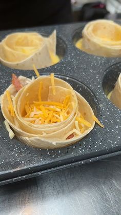 some food that is in a muffin tin