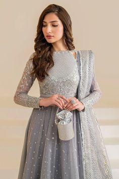 Made from high-quality chiffon, this 3-piece ensemble in beautiful gray is a must-have for any wardrobe. The intricate embroidery adds a touch of sophistication, highlighting your individual sense of fashion. Enhance your style with this versatile and refined outfit. Included - 3 piece (top, bottom and dupatta with accessories) Fully Stitched Original Designer Dress All accessories shown in images like buttons, & pearls are included Dress fabric: chiffon silk Embroidered front and back Embroider Anarkali With Palazzo, Chiffon Anarkali, Lucknowi Kurta, Gharara Suits, Patiala Salwar Suits, Bridal Dupatta, Semi Formal Wear, Kurta Dress, Chiffon Collection