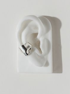 PLEAT Ear Cuff – F A R I S Faris Jewelry, Ear Cuff Silver, Earring Cuff, Silver Ear Cuff, Jewelry Inspo, Pretty Jewellery, Conch, Metal Jewelry, Ear Piercings