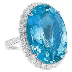 Guild Certified 20.28 CT Vivid Blue Aquamarine 18K Gold Ring with Diamonds 1 Vivid Blue Aquamarine - 20.28 CT Guild Certification: Modified Brilliant Vivid Blue ( Exceptional Santa Maria Color ) Diamonds - 1.738 CT 18K Gold - 10.32 GM Blue Aquamarine Ring, Ring Video, 18k Gold Ring, Modern Ring, Aquamarine Rings, Aquamarine Blue, Stone Cuts, Gold Diamond Rings, Blue Diamond