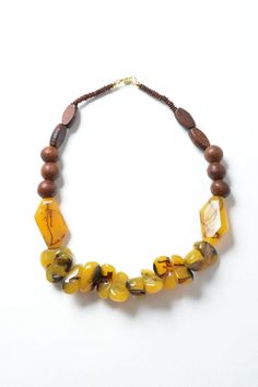 **This product is shipped by a third party warehouse within the US and may arrive separately from your complete order. This Chunky Amber Resin Beaded Necklace is perfect for adding a pop of color to any outfit! The beads are brightly colored and fun to wear, and the necklace is made from high-quality materials that will last. #lovemyleto Imported Amber Bead Necklace, Amber Resin, Bachelorette Dress, Amber Necklace, Amber Beads, Western Boho, Resin Beads, Earthy Colors, Headband Hairstyles