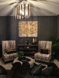 a living room with two chairs and a coffee table