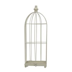 a white metal birdcage with wheels