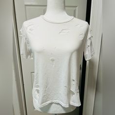 Shein Women’s Distressed, Basic White T-Shirt. Never Worn, But Washed One Time. Size Large Ripped Short Sleeve T-shirt For Summer, White Distressed Crew Neck Top, Casual White Distressed Tops, White Distressed Short Sleeve Tops, Ripped Short Sleeve Cotton Top, Ripped Crew Neck Top For Summer, Distressed White T-shirt For Spring, Trendy Ripped Summer Tops, Summer Ripped Relaxed Fit Top