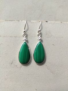 Malachite Pearshape Dangle Drop Earrings, 925 Sterling Silver Handmade Earrings, Gift for Her, Gemstone Earrings, Birthstone Earrings Metal Color: Sterling silver Stamp - 925 What will you get - Silver earring , gift box ,30 days guarantee card Returns and exchanges - 30 days Our Goal is 100% Customer Satisfaction :- -: We use Natural Gemstone & Solid 925 Silver:- -: All Products Description are 100% Metal name - silver Stone Name -Gemstone malachite We are manufacturing unit from Jaipur, Rajast Green Sterling Silver Teardrop Earrings, Sterling Silver Teardrop Gemstone Earrings, Sterling Silver Gemstone Teardrop Pendant Earrings, Green Sterling Silver Teardrop Dangle Earrings, Green Sterling Silver Long Drop Earrings, Sterling Silver Natural Stones Teardrop Earrings, Sterling Silver Gemstone Teardrop Earrings, Sterling Silver Long Drop Teardrop Gemstone Earrings, Sterling Silver Teardrop Earrings With Natural Stones