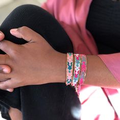 Bundle and SAVE! Good friends make the fabric of life more colorful, just like these bracelets! Grab a bundle and honor your friendships by gifting one to each of your best pals! Inspired by the otherworldly magic of canyon valley sunsets, these beaded and hand-woven bracelets are made by fair-trade female artisans in Indonesia, and feature an adjustable pull-tie closure and a dainty Love Is Project tag made of beautiful brass. Handmade with LOVE in Indonesia Colorful, stackable, and fun! Make g Shark Friendship Bracelet, Love Bracelet, Woven Bracelets, Macrame Design, Women Artisans, Love Bracelets, Love Love, Bracelet Stack, Ball Chain