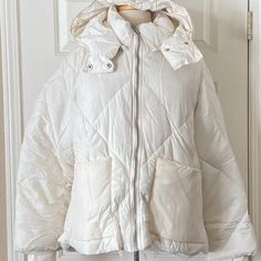 100% Authentic Womens Free People Emmy Swing Puffer Jacket (Msrp $168). This Jacket Is Brand New Without Tags! Color: Bones Size: Large Oversized, Slouchy Fit Detachable Hood Funnel Neck Zip Front Closure Front Patch Fleece Lined Pockets Long Sleeves With Ribbed Cuffs 58% Nylon, 42% Polyester Winter White Hooded Down Puffer Jacket, White Down Outerwear With Double-lined Hood, White Hooded Quilted Puffer Jacket, Winter White Down Puffer Jacket With Detachable Hood, Hooded Puffer Jacket For Spring, White Down Outerwear With Detachable Hood, Winter White Puffer Jacket With Double-lined Hood, White Nylon Puffer Jacket With Detachable Hood, White Nylon Puffer Jacket With Double-lined Hood