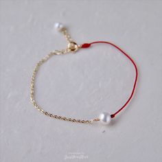 Unique designs of red thread and gold chain bracelets with freshwater pearls. Adjustable Red Jewelry With Pearl Charm, Red Pearl Bracelets As A Gift, Red Pearl Bracelets For Gifts, Red Pearl Bracelets For Gift, Red Pearl Bracelet As A Gift, Red Pearl Bracelet As Gift, Red Pearl Bracelet Gift, Bracelet Extender, Gold Chain Bracelet