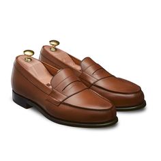 Tan Leather Penny Loafers for Men’s Tan Casual Shoes Classic Leather Moccasins For Galas, Classic Leather Shoes With Goodyear Welt For Galas, Classic Goodyear Welted Leather Shoes For Galas, Classic Leather Shoes For Galas, Classic Bridle Leather Shoes For Office, Classic Bridle Leather Office Shoes, Classic Tassel Loafers With Leather Sole For Galas, Classic Round Toe Moccasins In Bridle Leather, Classic Moccasins With Rubber Sole For Galas