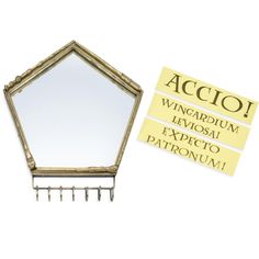 a mirror that is sitting next to a sticker with words written on it and attached to the mirror