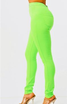 These sleek, skinny-fit pants offer both comfort and style with a high-rise waist and stretch fabric that accentuates your curves for a flattering silhouette. With round back pockets, these pants add both function and fashion to your everyday look. Skinny fit Stretchy Round back pockets Button closure Available in white, neon purple and neon green Trendy Stretch Leggings, Trendy Fitted Leggings, Stretch Elastane Jeggings With Straight Leg, Stretch Straight Leg Elastane Jeggings, Trendy Tight High Waist Bottoms, Trendy High Rise Stretch Leggings, Green Stretch Elastane Leggings, Trendy High Rise Leggings For Spring, High Waist Stretch Leggings Trendy Style