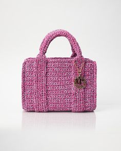 - 100% Handmade - Pink/Lilac - L:30cm x H:20cm x W:10cm - Circular, hand-crocheted, top handle - Comes with dust bag to always keep your Miss Polyplexi bag protected and clean The Miss Polyplexi Bella Tote bag is perfect for everyday use. It is hand-crocheted in Greece by local female artisans, made from high-quality chenille yarn for a soft and luxurious feel. It swings from double top handles, featuring a quite spacious interior. It is ideal for storing your daily essentials. Easy to carry fro Quite Luxury, Lilac Crochet, Crochet Handbag, Chenille Yarn, Pink Lilac, Crochet Tote Bag, Office Look, Crochet Tote, Handmade Bag