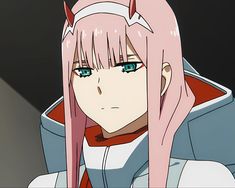 an anime character with pink hair and blue eyes